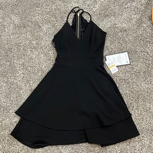 macy’s black mini dress super flattering size 7/8 stunning back never worn